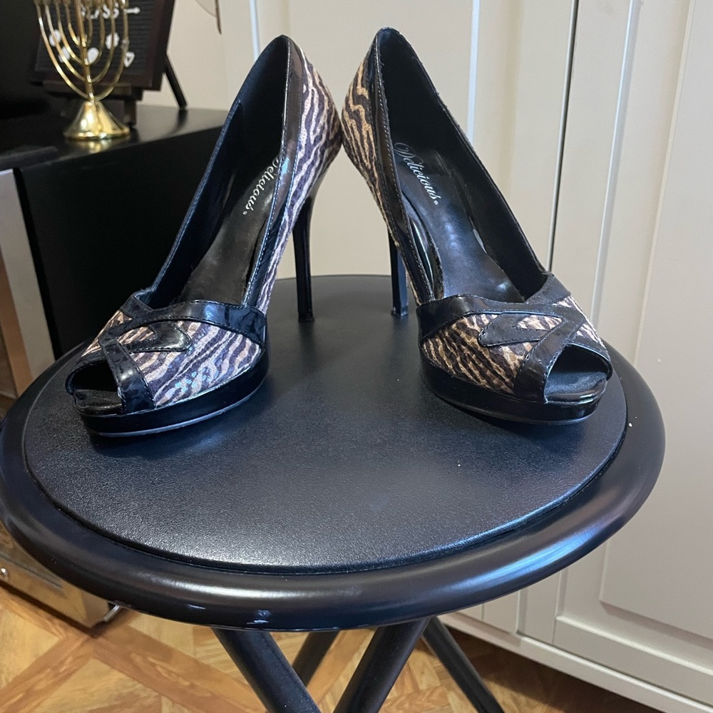 Animal print, size 7, peep toe heels